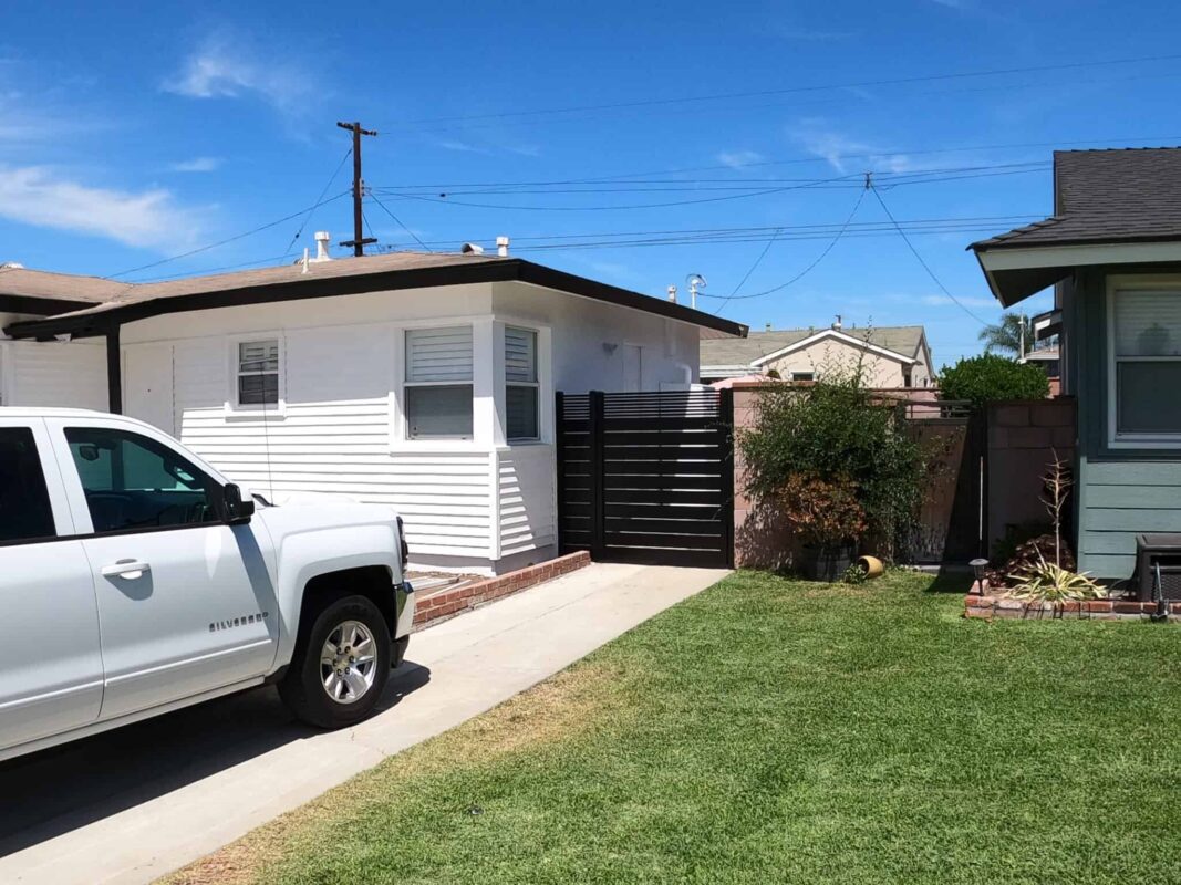 Black Aluminum fence and pedestrian gate