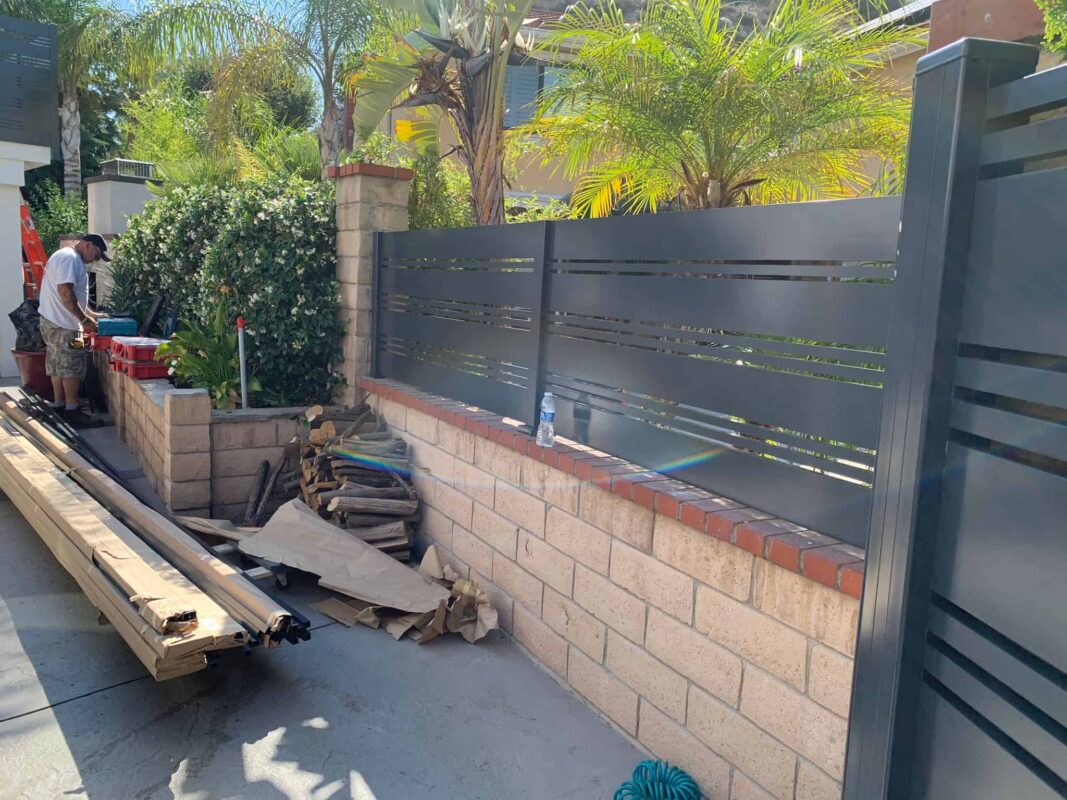 Black Aluminum fence and pedestrian gate