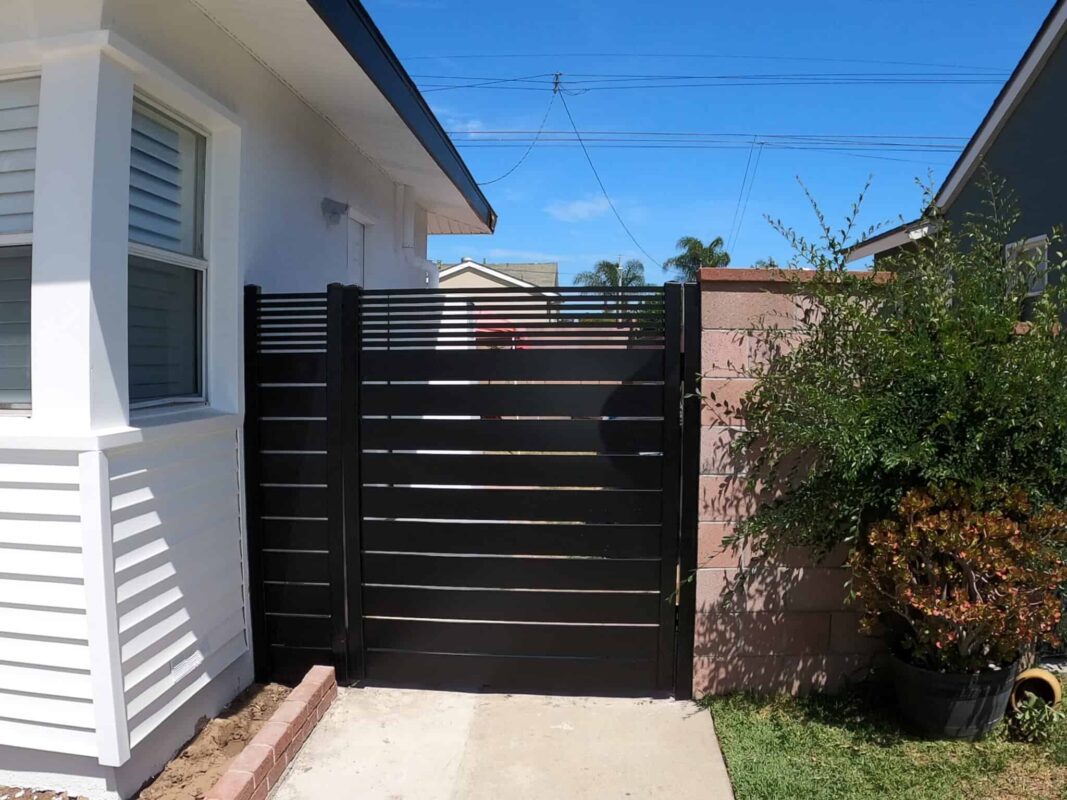 Black Aluminum fence and pedestrian gate