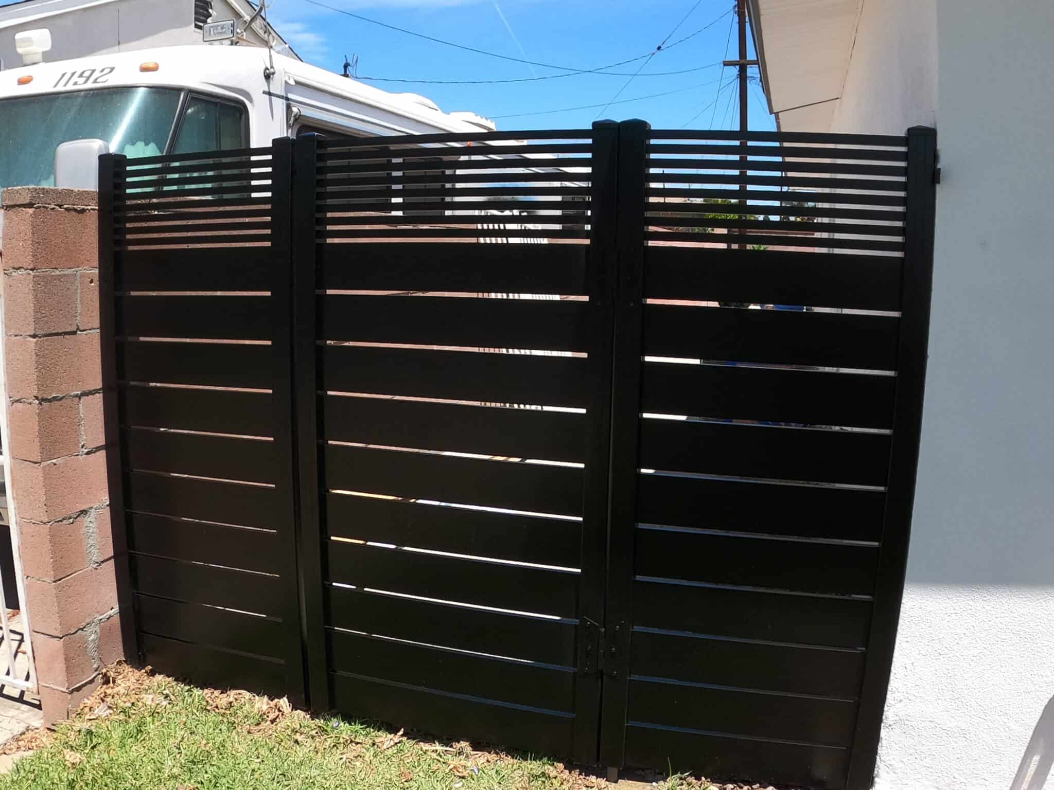 Black Aluminum fence and pedestrian gate
