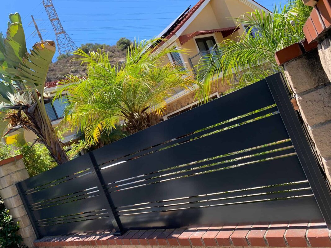 Black Aluminum fence and pedestrian gate