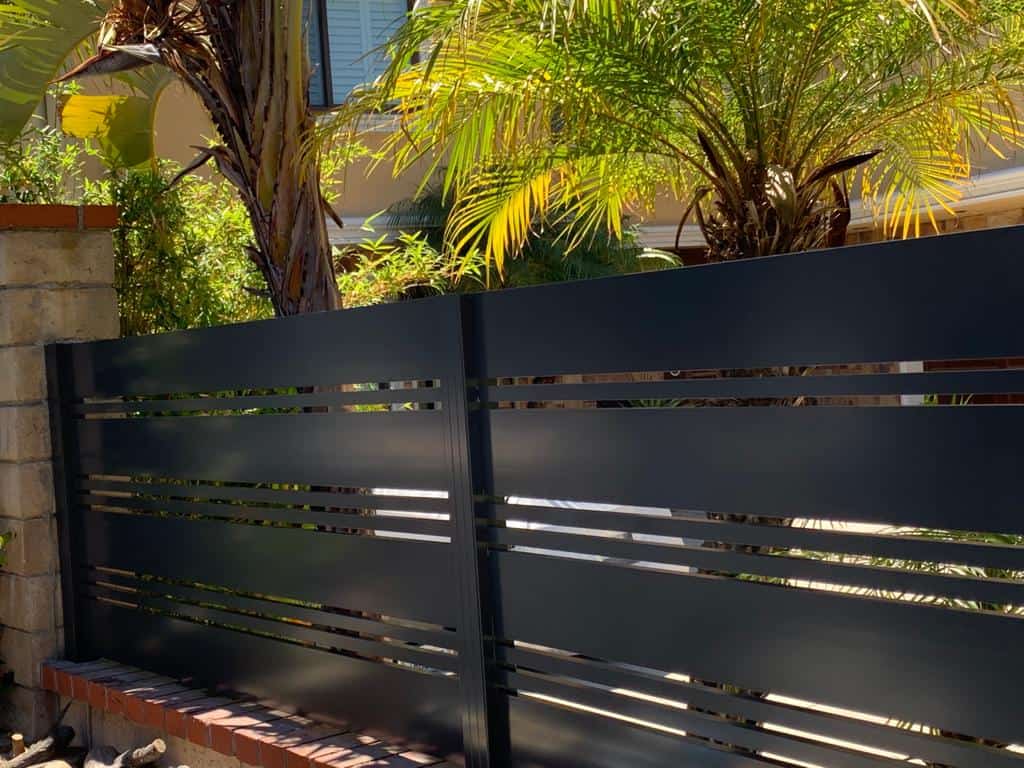 Black Aluminum fence and pedestrian gate