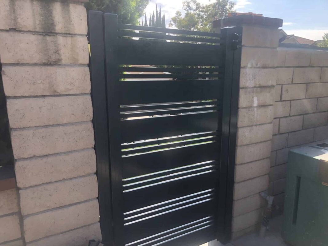 Black Aluminum fence and pedestrian gate