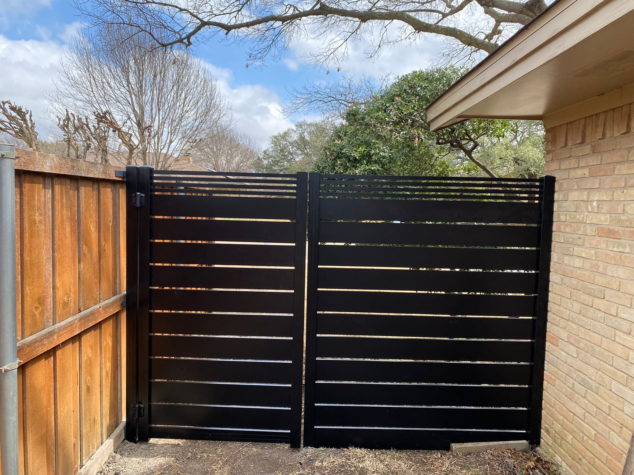 Black Dallas Style aluminum fence and gate