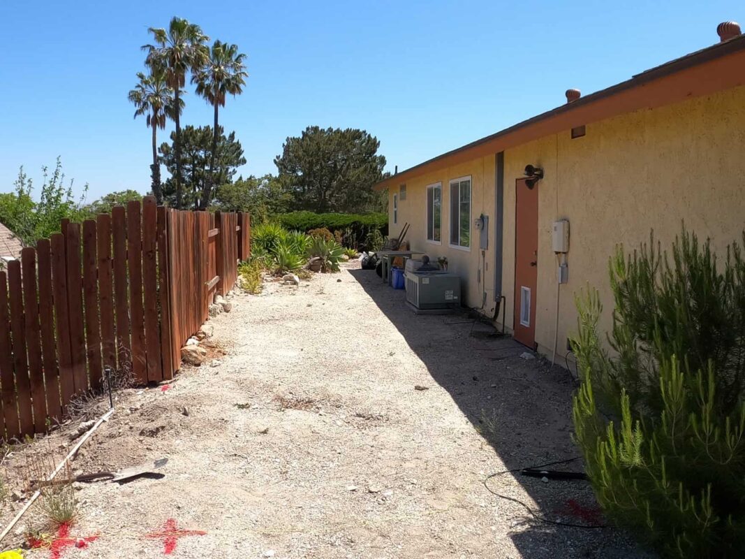 Brown Aluminum fence and pedestrian gate