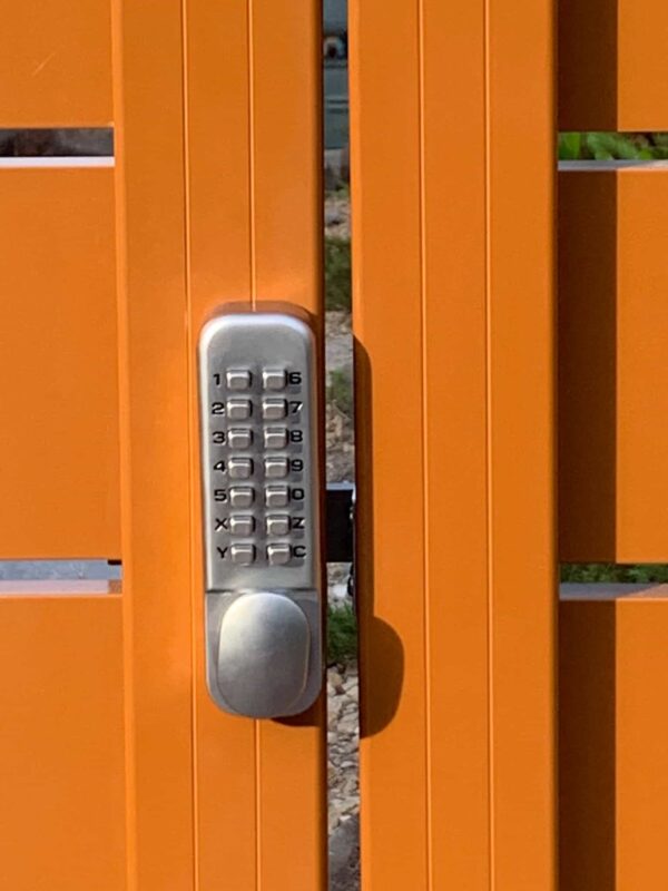 Brown Aluminum fence and pedestrian gate