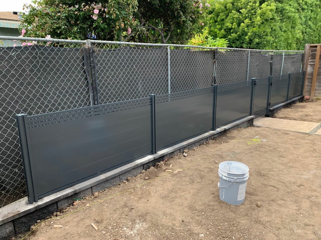 Light grey fences and gates