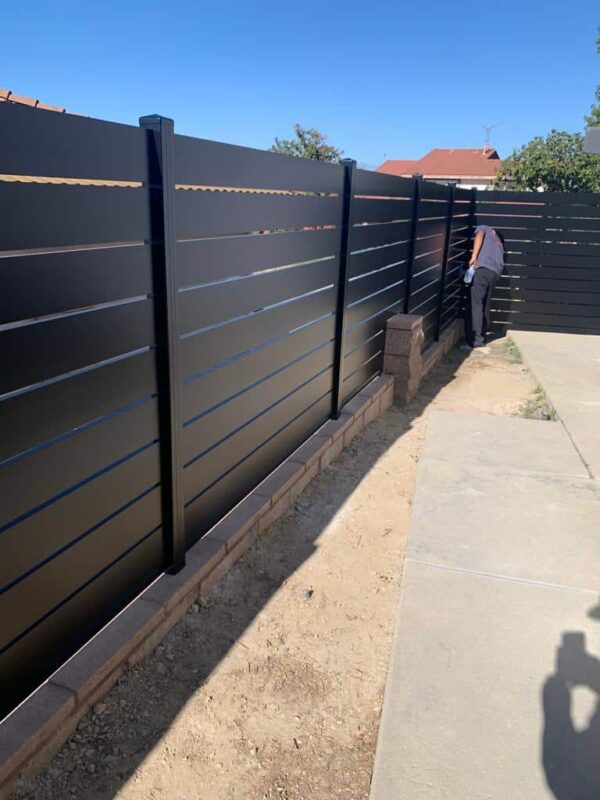 Modern black aluminum fence