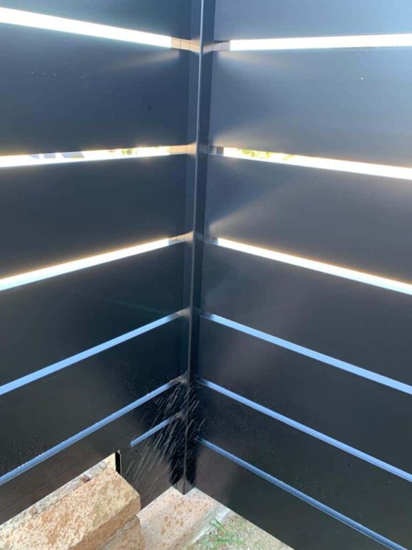 Modern black aluminum fence