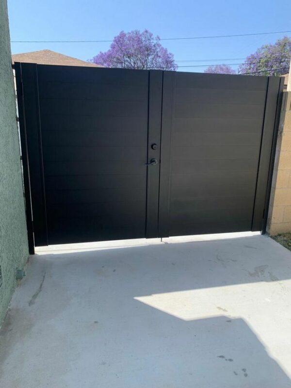 Double swing black driveway gates in Austin
