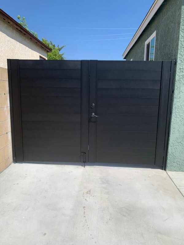 Double swing black driveway gates in Austin