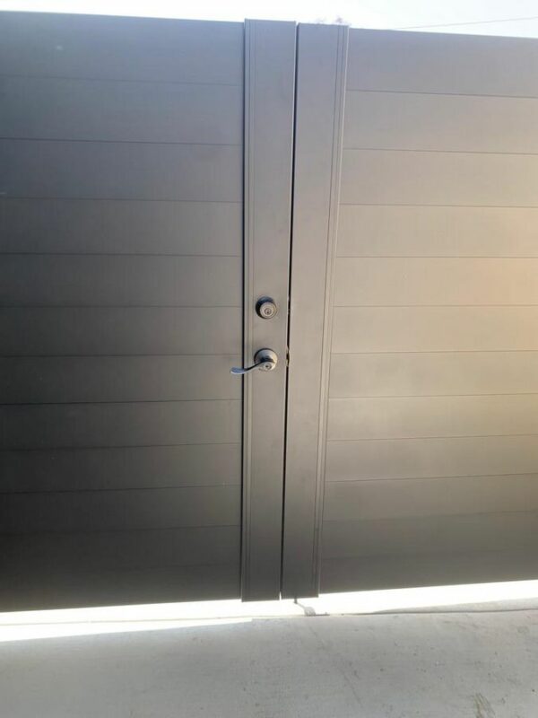 Double swing black driveway gates in Austin