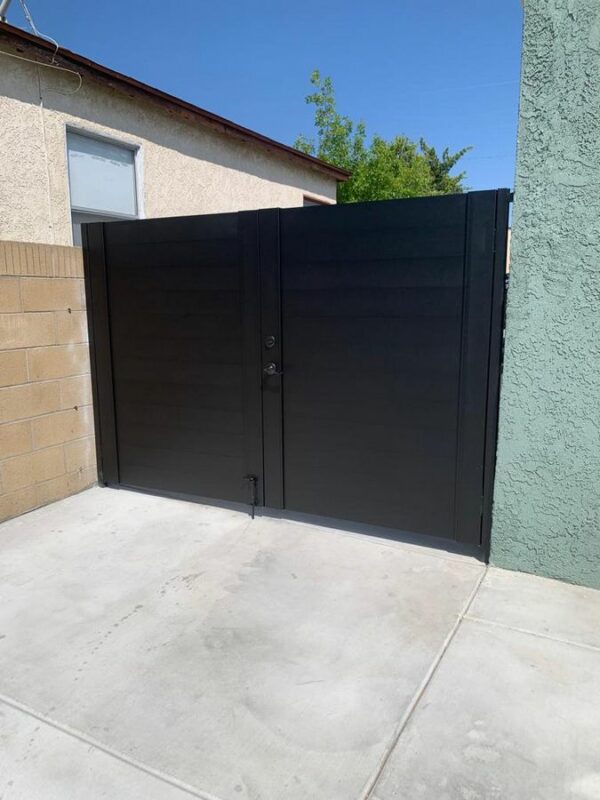 Double swing black driveway gates in Austin