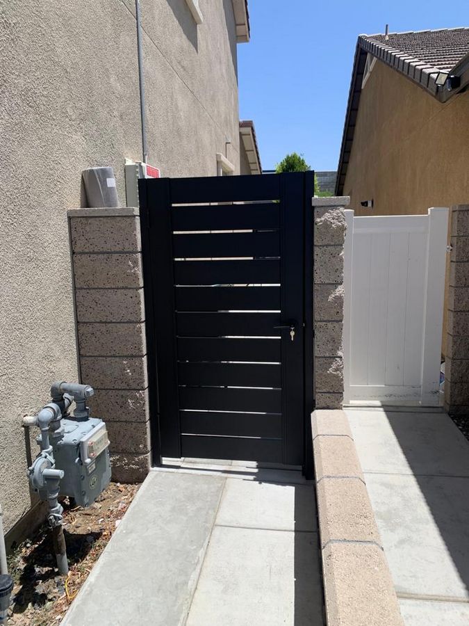 Black Aluminum side yard gates in Scottsdale