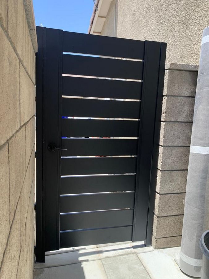 Black Aluminum side yard gates in Scottsdale