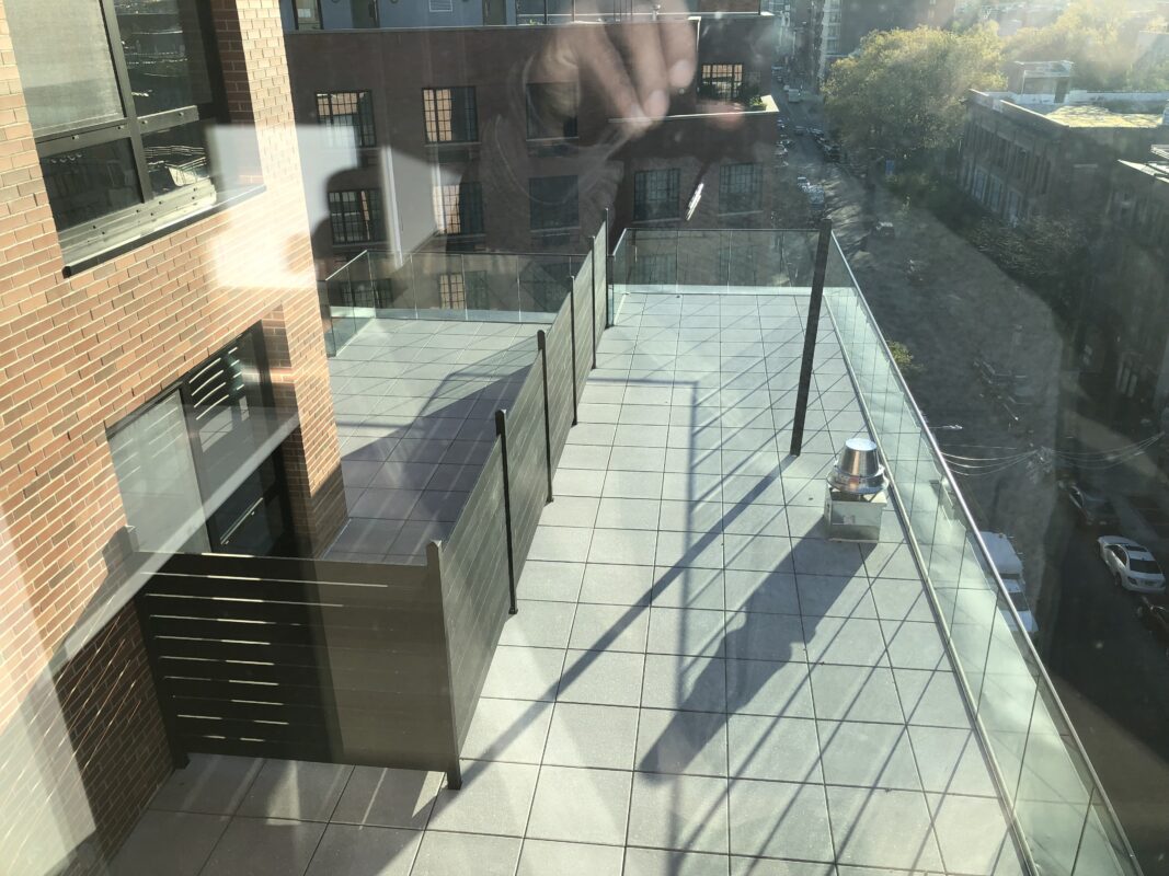 Aluminum fence on a rooftop in Brooklyn