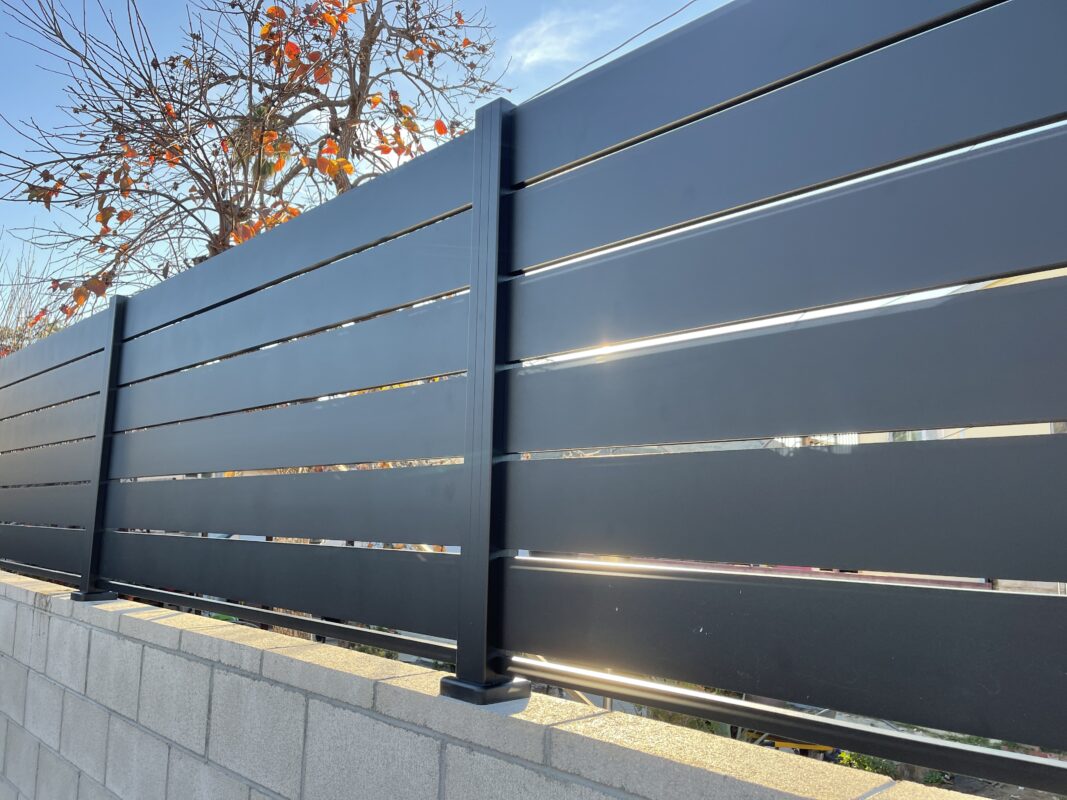 Black aluminum wall topper in Los Angeles