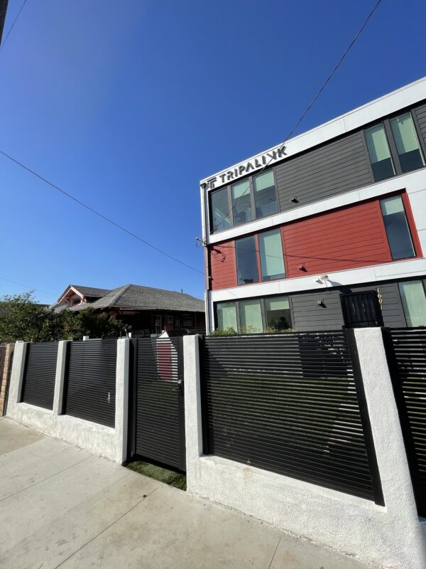 Tripalink building with alumimum fence panels