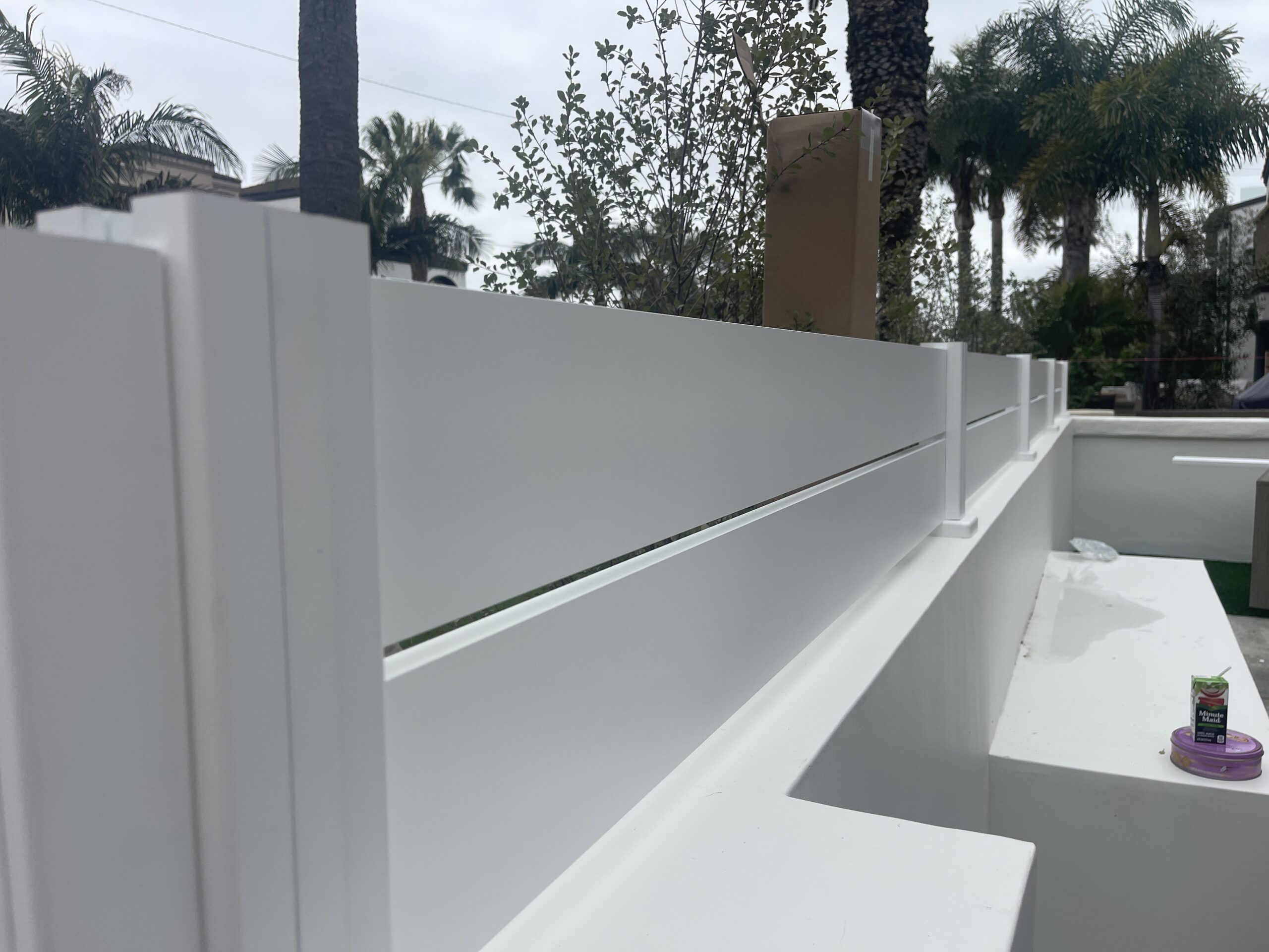 White aluminum wall topper in Huntington Beach