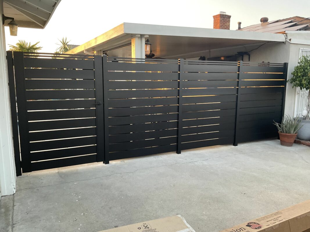 6' Fence and pedestrian gate on concrete slab in Plano, TX