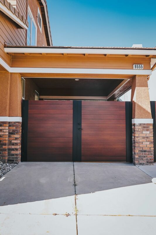 Aluminum look like wood double swing gate from Alumission Modern Aluminum Fences & Gates