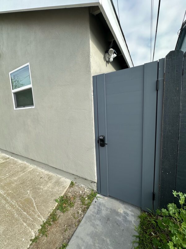Front view of pedestrian gate equip with keypad lock