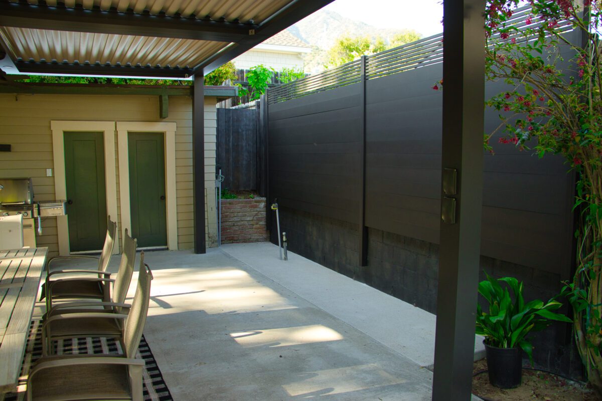 Aluminum Bronze Fence Privacy Panels Installed In Residential Area