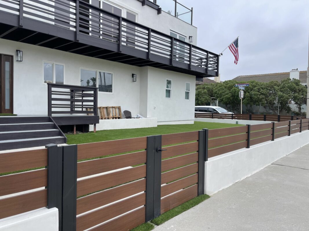 Wood Finish Pedestrian Gate and Matching Wall Toppers