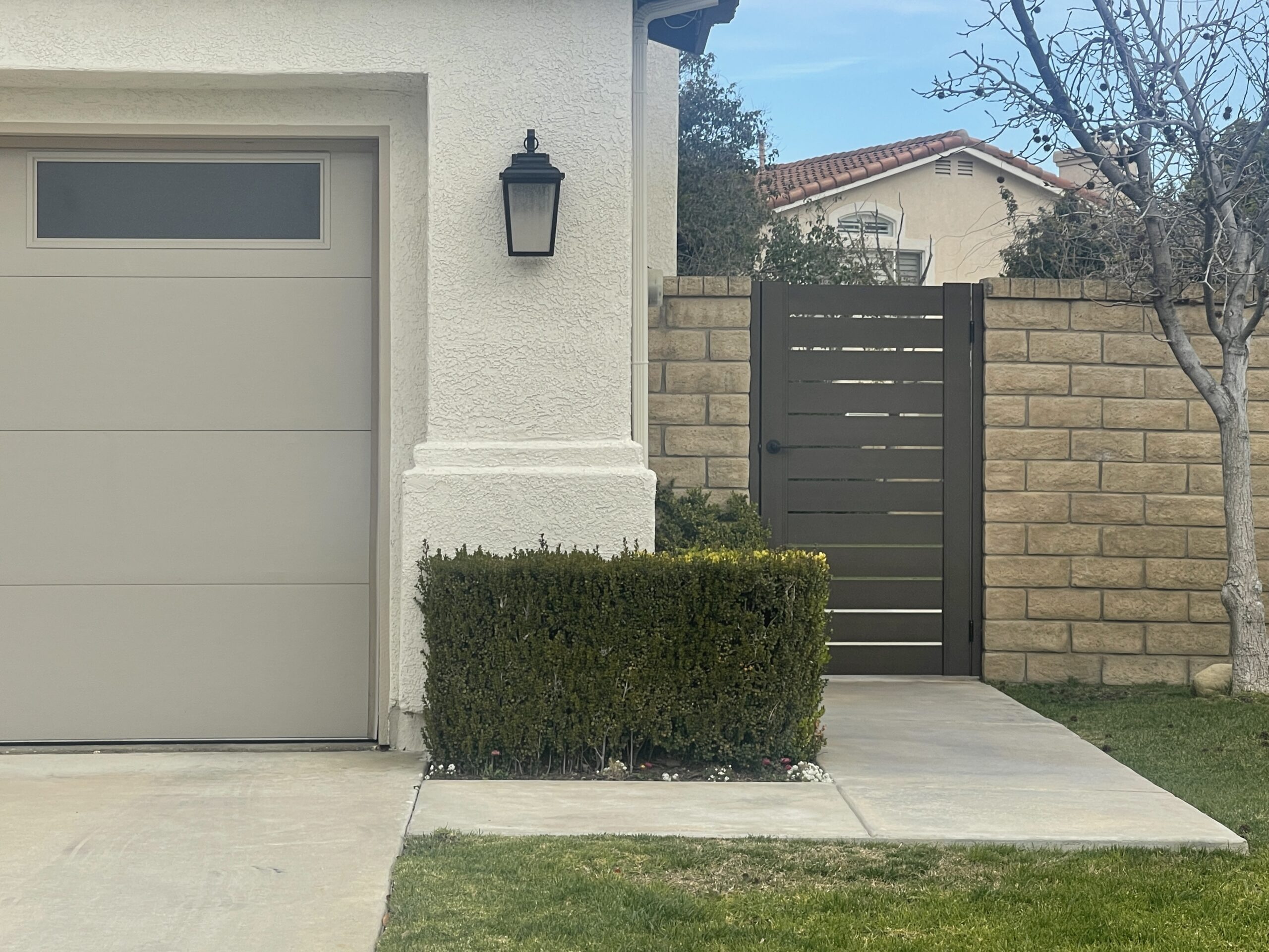 Tall Bronze Pedestrian Gate Side of Home