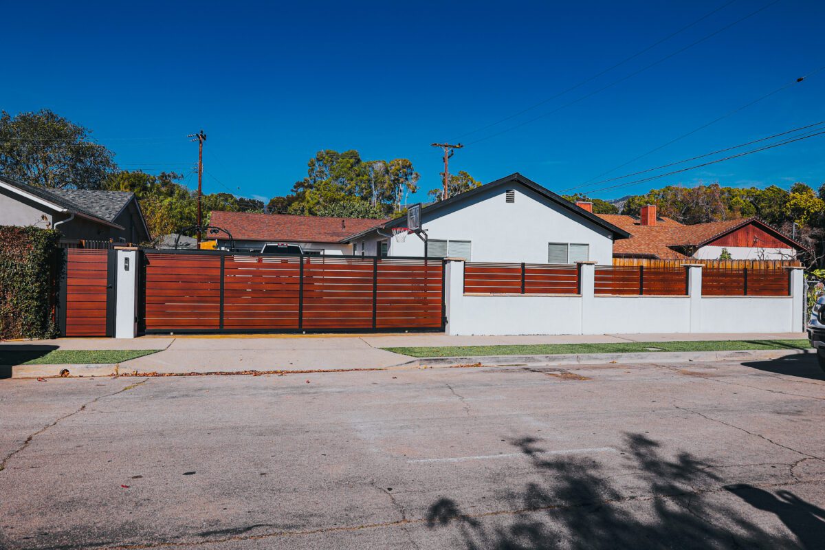 Modern aluminum fence and gate installation enhancing a Santa Barbara property.