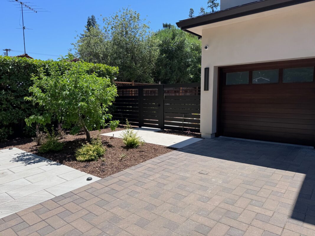 Completed fence installation enhancing security and aesthetics of the property.