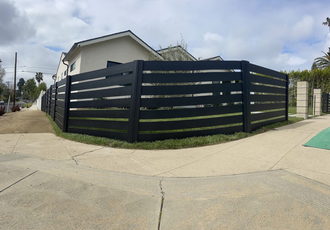 Modern black aluminum fence enhances curb appeal and security in North Hollywood, CA.